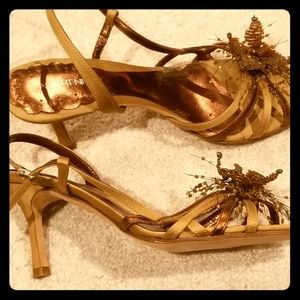 Designer sandals with beaded flower